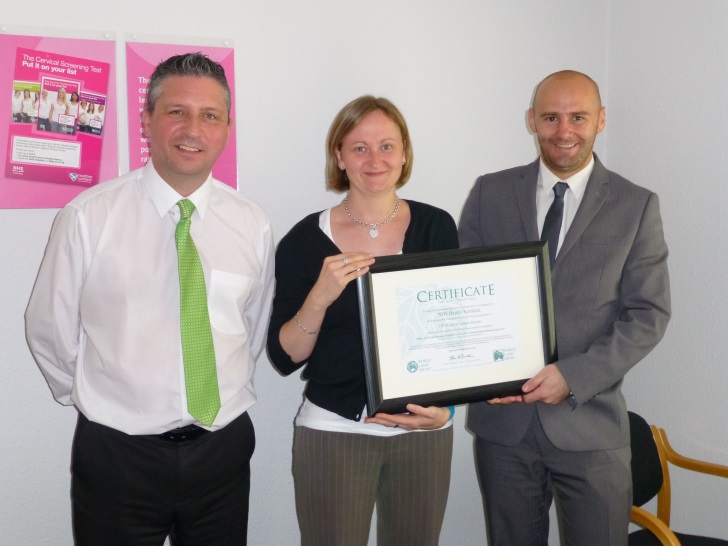 21 Colour present certificate of achievement to the NHS